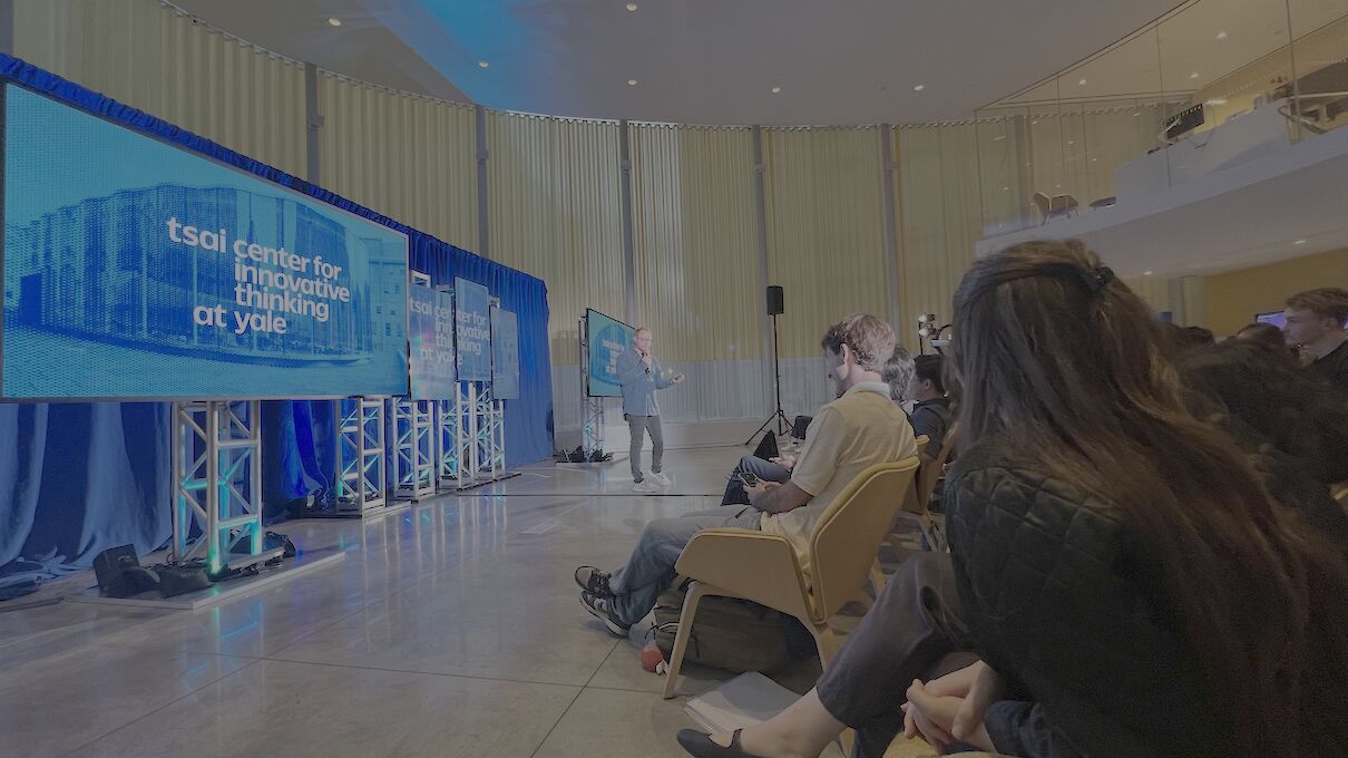 presenting in front of big screens